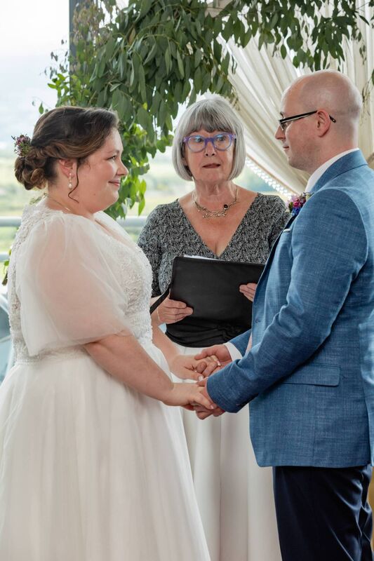 Sarah Abbott and Brian Harmon with celebrant Geraldine O'Neill. Pictures: Tara Donoghue