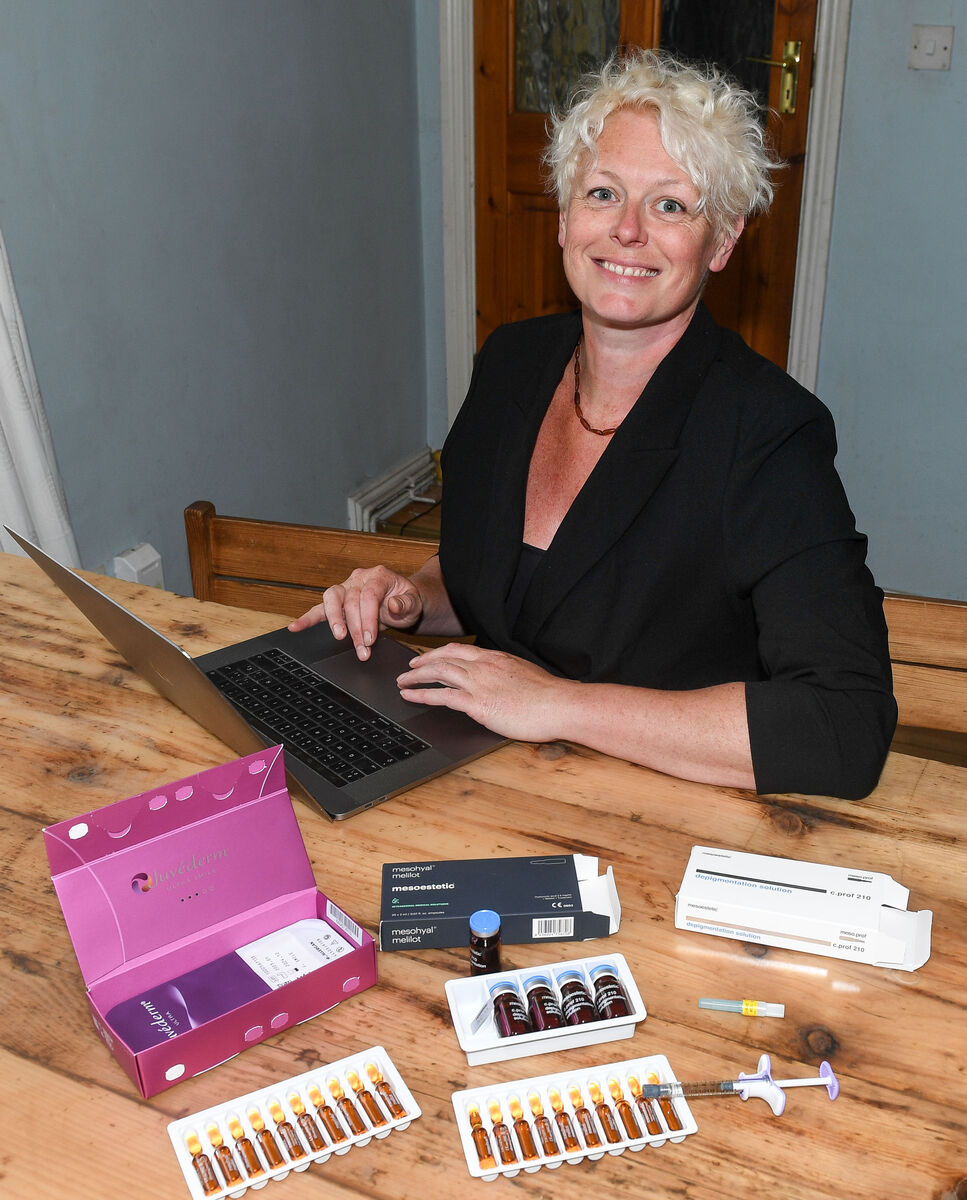 Ellie O'Byrne with some of the injectable cosmetics she ordered online. A popular brand of filler used to plump the lips, pre-loaded into syringes, came with the warning that it should only be used “by an authorized medical practitioner". Picture: David Keane