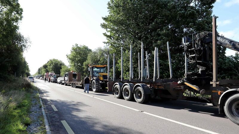 A cavalcade of more than 100 trucks, tractors, and cars assembled to give a flavour of the congestion protesters say will return to Macroom when a new section of bypass opens next week, curtailing local access. Picture: Jim Coughlan
