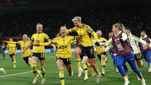 <p>VICTORY: Sweden's players celebrate their win over champions USA in a dramatic penalty shootout. Pic: Robert Cianflone/Getty Images</p>