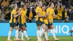 <p>THROUGH: Australia's Hayley Raso celebrates with her team.(AP Photo/Rick Rycroft)</p>