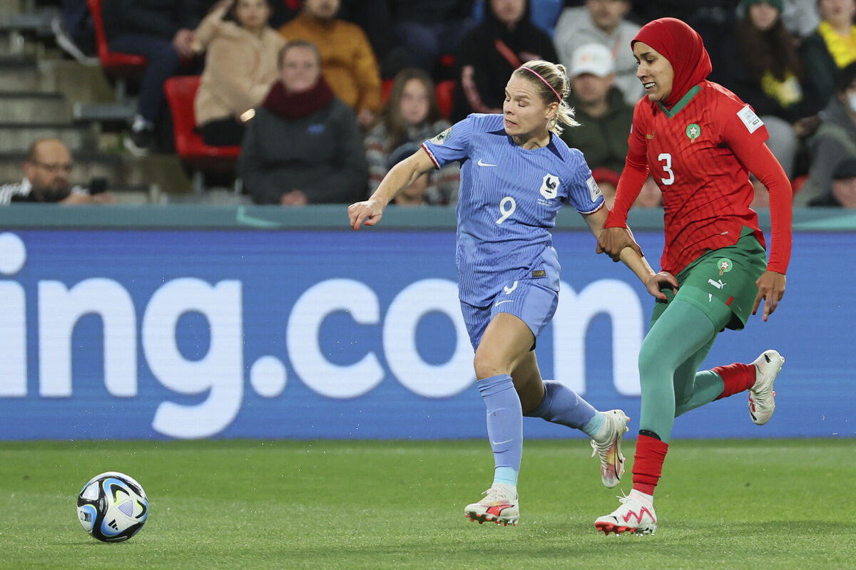 France's Eugenie Le Sommer, left, and Morocco's Nouhaila Benzina battle for the ball. France's Eugenie Le Sommer, left, and Morocco's Nouhaila Benzina battle for the ball.