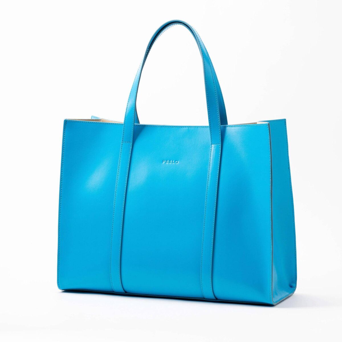 Ibiza Blue Tote, €295, Peelo
