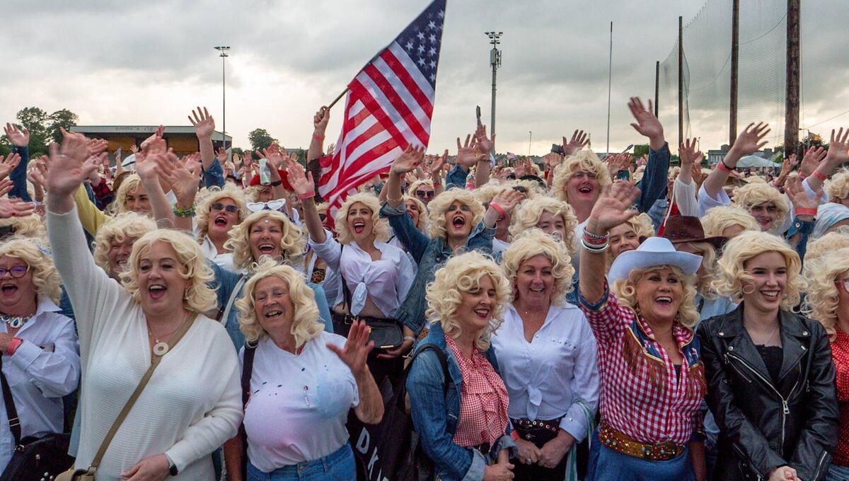 A total of 1,137 Dolly Parton lookalikes made their way to Frank Sheehy Park in Listowel in June, and 959 of them were included in the official Guinness World Record tally. File picture A total of 1,137 Dolly Parton lookalikes made their way to Frank Sheehy Park in Listowel in June, and 959 of them were included in the official Guinness World Record tally. File picture
