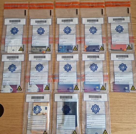 Cards and cash seized from a money mule detected using 8 different ATM machines in Ireland to make illicit withdrawals. Picture: Interpol