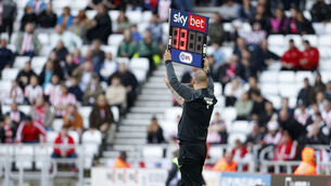 The fourth official indicates 13 added minutes at the Sunderland v Ipswich game in the Championship last weekend (Richard Sellers/PA)