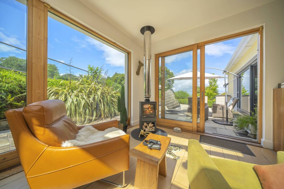 Large sliding doors in several rooms open to the large patio