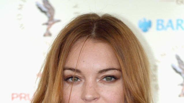 Lindsay Lohan has shared her first picture since giving birth (PA Archive/Anthony Devlin)