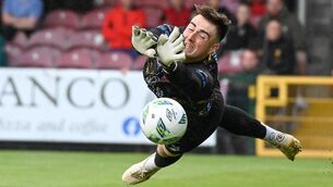 <p>FULL STRETCH: UCD's Lorcan Healy makes a superb save to deny Cork City, during their SSE Airtricity League Premier Division clash at Turner's Cross. Pic: David Keane</p>