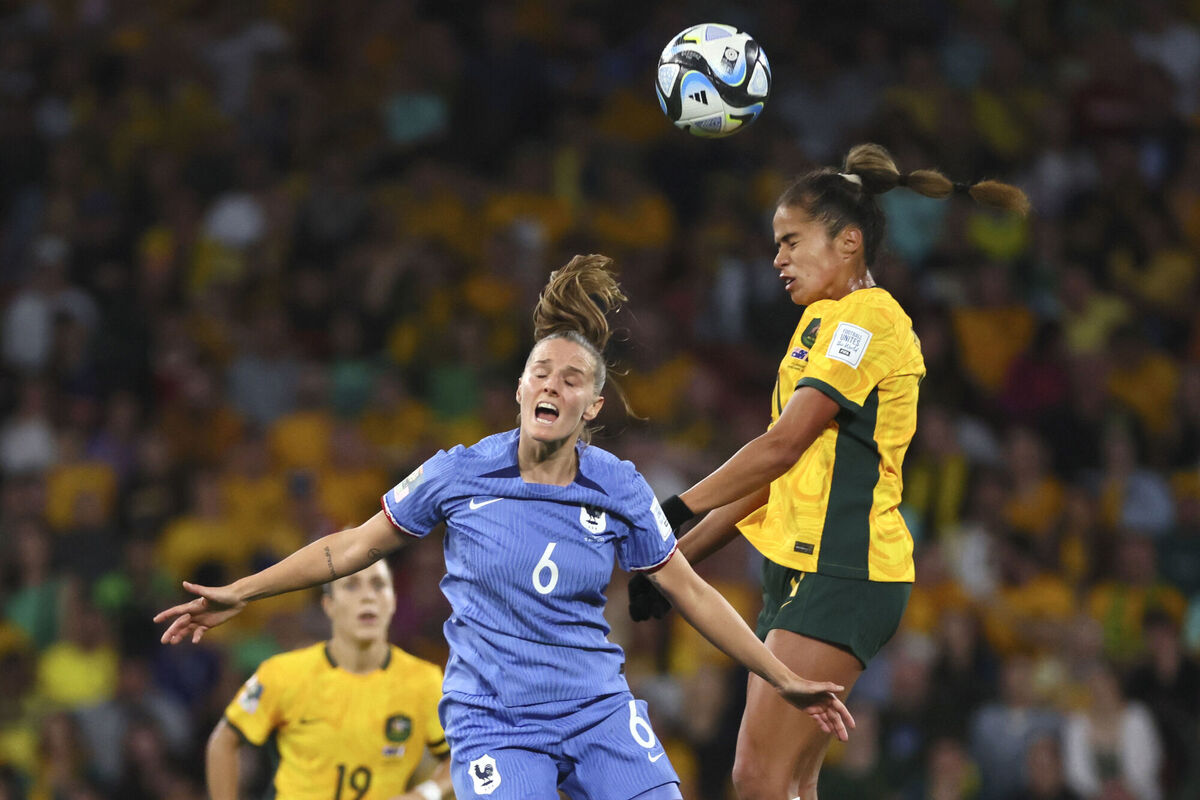 Australia's Mary Fowler, right, challenges for the ball with France's Sandie Tolett.