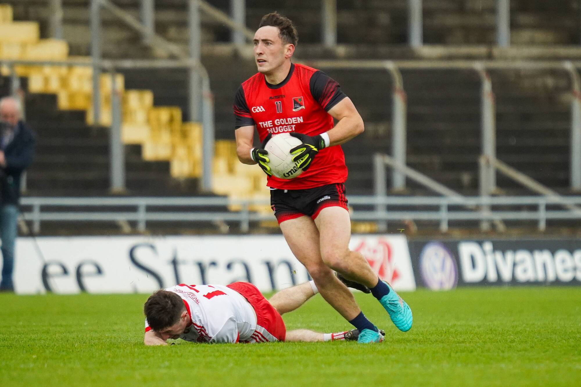 PLAYMAKER EXTRAORDINAIRE: Paudie Clifford, Fossa being challenged by Steven O Conchuir of Gaeltacht in a Kerry IFC clash in Tralee.