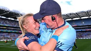 <p>Dublin manager Mick Bohan celebrates with team captain Carla Rowe after their side's victory in the 2023 TG4 LGFA All-Ireland Senior Championship Final match between Dublin and Kerry at Croke Park in Dublin. Photo by Piaras Ó Mídheach/Sportsfile</p>