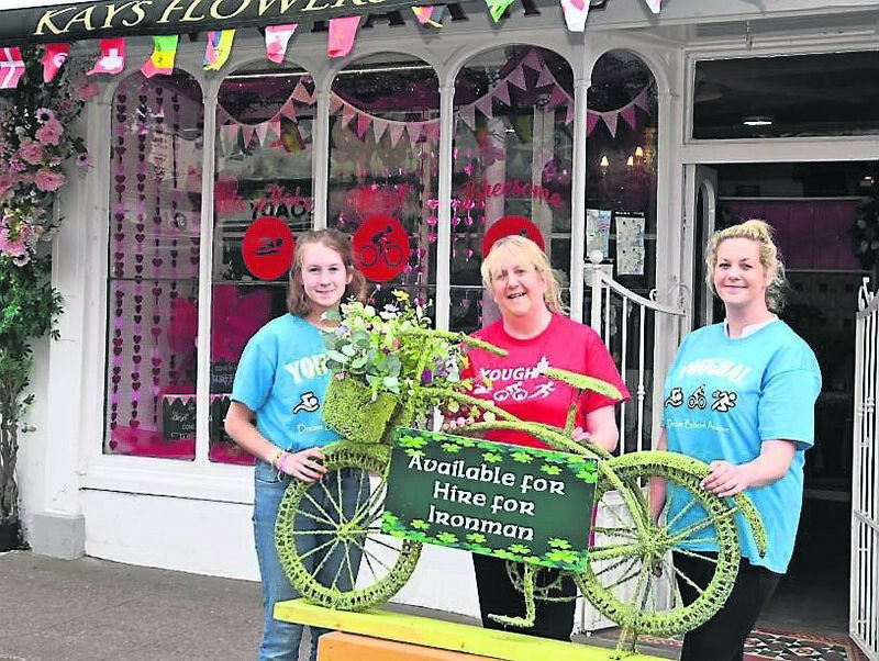 Kay Curtin of Kay’s Flowers with her daughters Orlaith and Alison at her shop, which is decorated for the next weekend’s Ironman in Youghal, Co Cork. Picture: Eddie O’Hare
Kay Curtin of Kay’s Flowers with her daughters Orlaith and Alison at her shop, which is decorated for the next weekend’s Ironman in Youghal, Co Cork. Picture: Eddie O’Hare