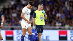 <p>France's Romain Ntamack leaves the game against Scotland with an injury</p>