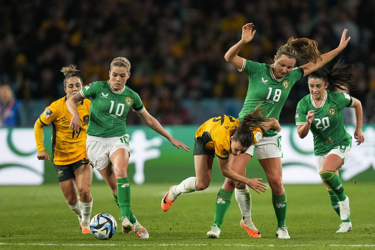 Ireland's Denise O'Sullivan, left, runs with the ball during the Women's World Cup soccer game between Australia and Ireland at Stadium Australia in Sydney, Australia, on July 20, 2023.