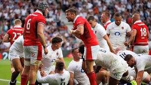 <p>CROSS PURPOSES: Wales’ Dan Lydiate and Dan Biggar have words after England’s Maro Itoje scored a try. Pic: INPHO/James Crombie</p>
