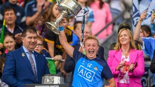<p>OUTSTANDING: Dublin captain Carla Rowe lifts the Brendan Martin Cup. Her last point encapsulated all that was good about her team's performance. Pic: John Sheridan/Sportsfile</p>