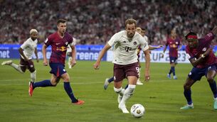 <p>DEBUT: Bayern's Harry Kane controls the ball during the German Super Cup final against RB Leipzig at the Allianz Arena stadium in Munich. Pic: AP Photo/Matthias Schrader</p>