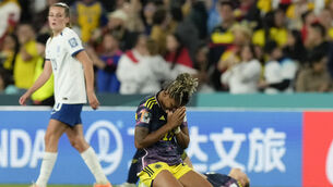 Colombia’s Jorelyn Carabali, shown on her knees after losing the Women’s World Cup quarter final against England, is mourning her brother after he was shot dead (AP Photo/Mark Baker)