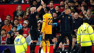 <p>FRUSTRATION: Gary O’Neil was booked by referee Simon Hooper for reacting after Wolves were denied a penalty. Pic: Nick Potts/PA</p>