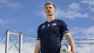 <p>ON THE PLANE: Ex-Munster ten Ben Healy at Wednesday's Scotland World Cup squad announcement in South Queensferry. </p>