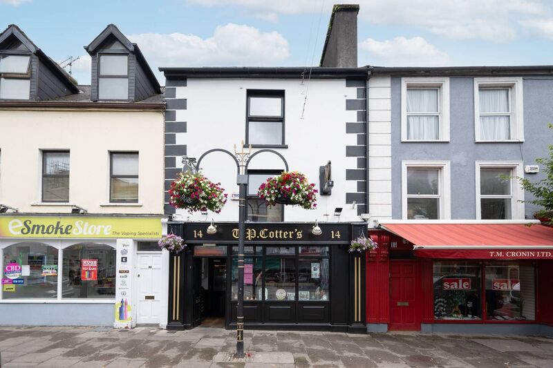 TP Cotter's (centre) and the premises to the left are included in the sale