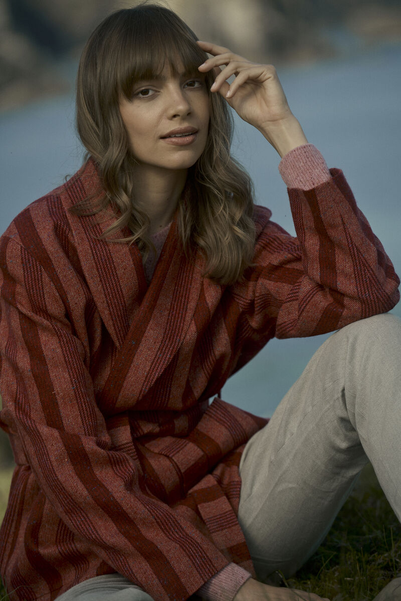 Klara Wrap, €350; Delphi Aran Crew Knitwear, €150; Tina Trousers, €129; by Magee 1866
