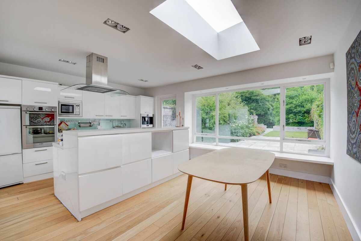 Extension was added beyond a courtyard to maintain light levels in the original rear room