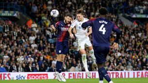 <p>SHARE OF THE SPOILS: Leeds United's Luke Ayling scores the team's first goal during the Sky Bet Championship game against West Brom. Pic: George Wood/Getty Images</p>