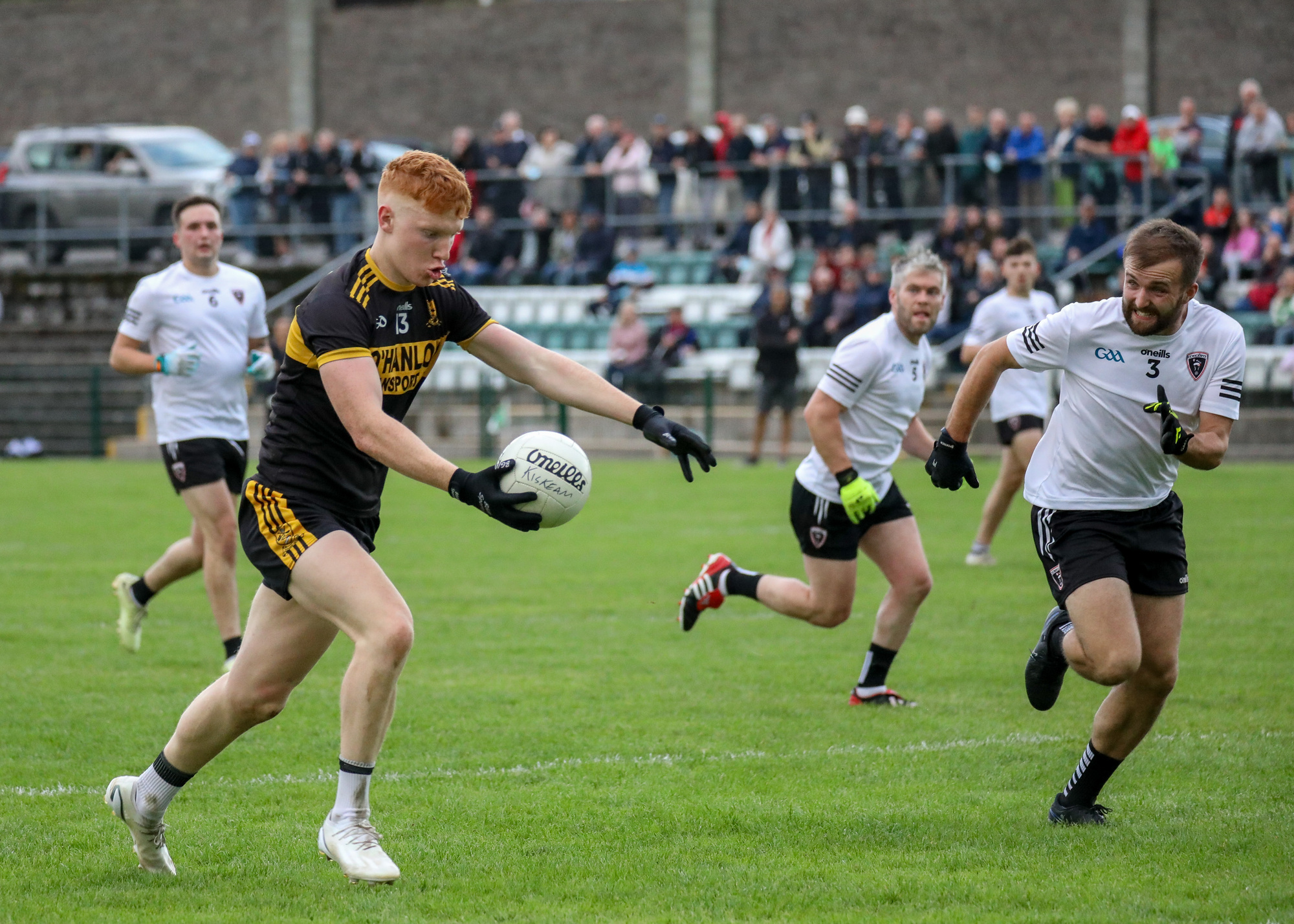 Clyda Rovers' Eoin Walsh about to be tackled by Jack O'Connor of Kiskeam during the SAFC Group B match in Kanturk. Picture: David Creedon