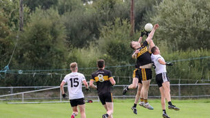 <p>BACK ON TRACK: Michael Herlihy of Clyda jumps for the dropping during the SAFC Group B match against Kiskeam. Pic: David Creedon</p>