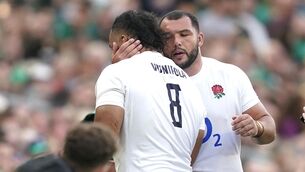 <p>NERVOUS WAIT: England's Billy Vunipola is consoled after seeing his yellow card upgraded to a red card for a high tackle against Ireland. Pic: Niall Carson/PA Wire</p>