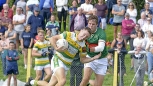 <p class="contextmenu internal_Caption">HEAD ON: Clonakilty's Ben Ridgeway tackling Carbery Ranger's Brian Shanahan. Picture Denis Boyle</p>