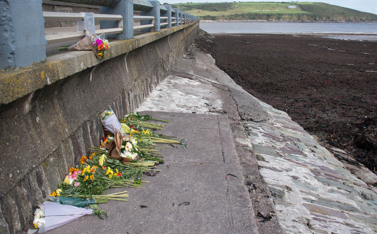 Flowers left in memory of the two Ironman athletes who lost their lives in Youghal. Picture: Howard Crowdy Flowers left in memory of the two Ironman athletes who lost their lives in Youghal. Picture: Howard Crowdy