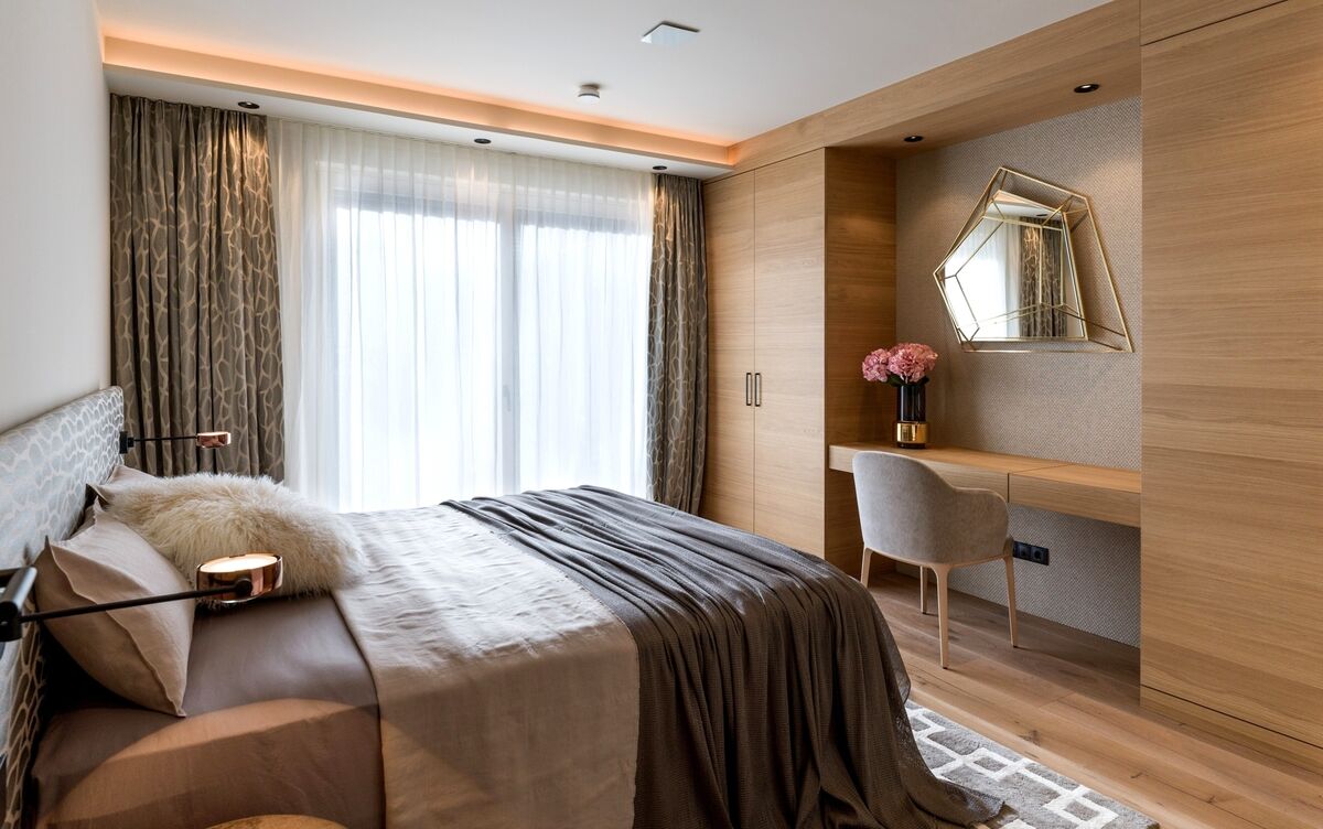 A tonal scheme and the use of boutique hotel hacks including wall lights to the bed delivers a small bedroom with massive style appeal. The floor matches the wardrobe door material, an unusual choice that blurs the edges of the surfacing, indicating more room;Â essentialhome.eu. A tonal scheme and the use of boutique hotel hacks including wall lights to the bed delivers a small bedroom with massive style appeal. The floor matches the wardrobe door material, an unusual choice that blurs the edges of the surfacing, indicating more room;Â essentialhome.eu.