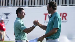 <p>UNFINISHED BUSINESS: Rory McIlroy and Scottie Scheffler speak after their round on the 18th green after last year's final round of the Tour Championship golf tournament at East Lake Golf Club. (AP Photo/Steve Helber)</p>