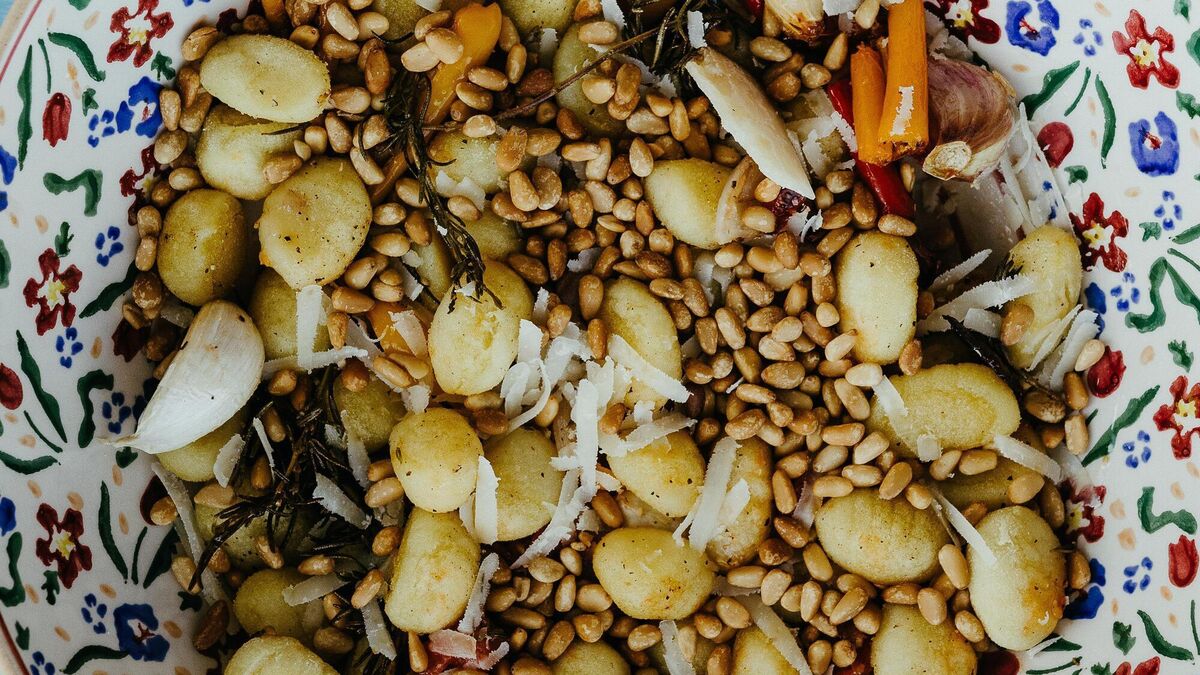 Gnocchi with Roasted Vegetables, Pine Nuts and Parmesan Cheese