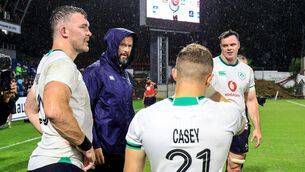<p>Ireland head coach Andy Farrell speaks with Peter O’Mahony, Craig Casey and James Ryan after the game</p>