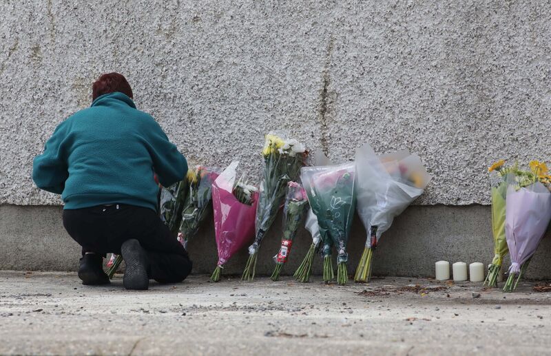 People leave flowers near the scene of the crash on Mountain Road, Clonmel. Picture: Collins Photos People leave flowers near the scene of the crash on Mountain Road, Clonmel. Picture: Collins Photos