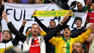 <p>Manchester United fans protest against the ownership of the club by the Glazers after the final whistle of the Premier League match at Old Trafford, Manchester. Picture: Nick Potts/PA Wire </p>