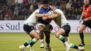 <p>TOUGH TEST: Tumua Manu of Samoa tackled by two Irish players. Pic Credit ©INPHO/Dave Winter</p>