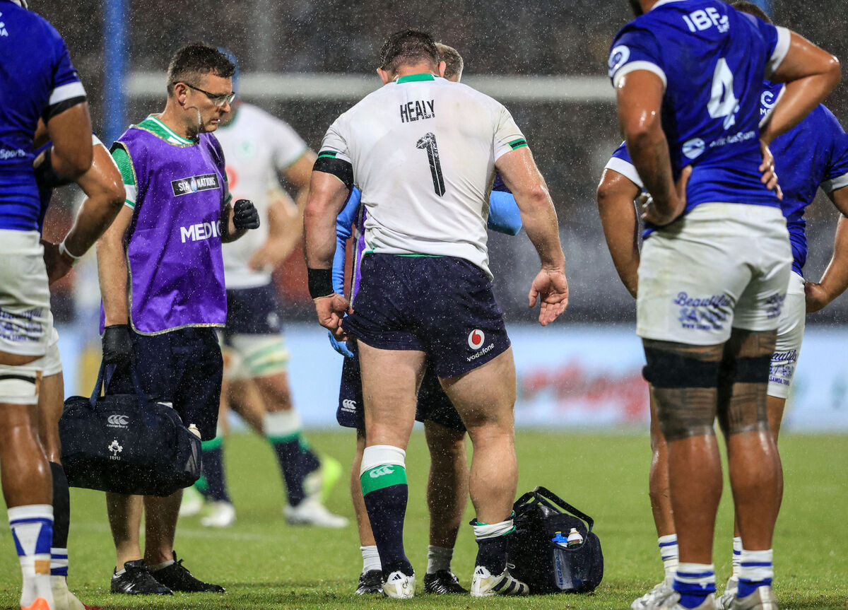 Ireland’s Cian Healy receives treatment from Dr. Ciaran Cosgrove in Bayonne before going off injured