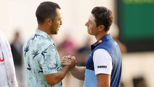 <p>ATLANTA, GEORGIA - AUGUST 27: Viktor Hovland of Norway is congratulated by Xander Schauffele of the United States on the 18th green after Hovland won during the final round of the TOUR Championship at East Lake Golf Club on August 27, 2023 in Atlanta, Georgia. (Photo by Mike Ehrmann/Getty Images)</p>