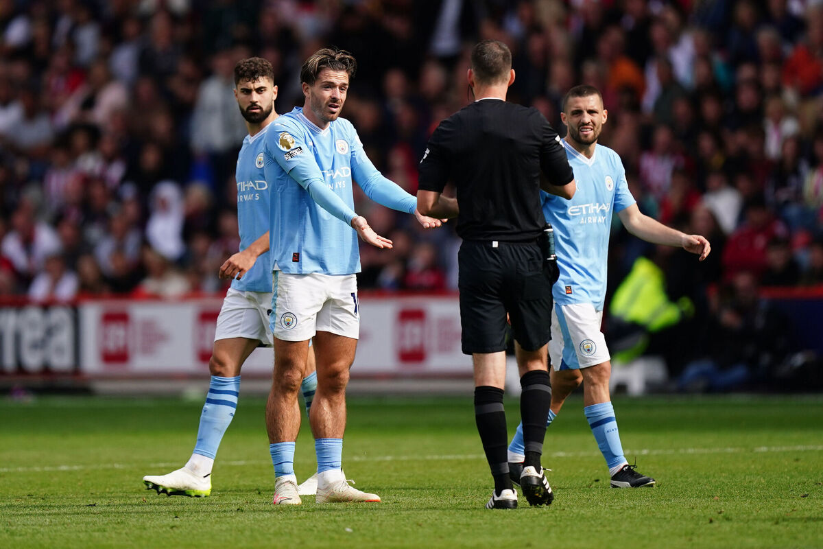 Manchester City's Jack Grealish raises complaints with referee Jarred Gillett. Photo credit: Mike Egerton/PA Wire.