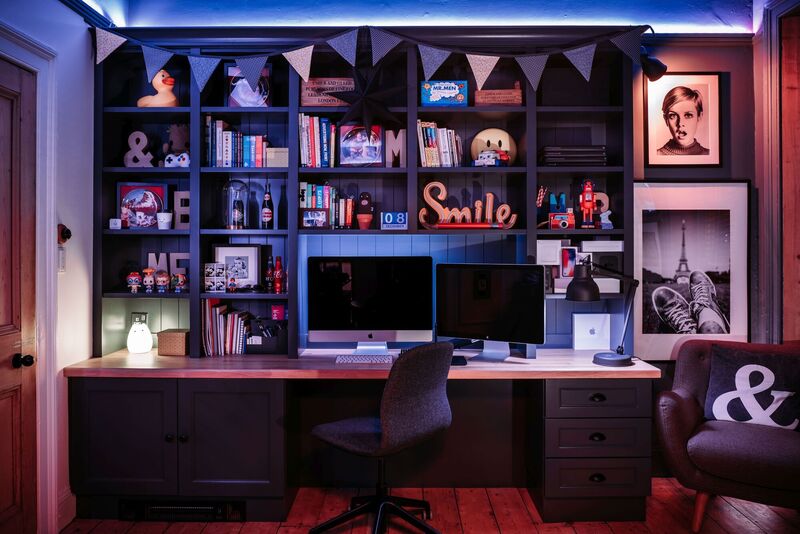  A modern home office sits comfortably in the context of original floors and door and heritage colour choices.