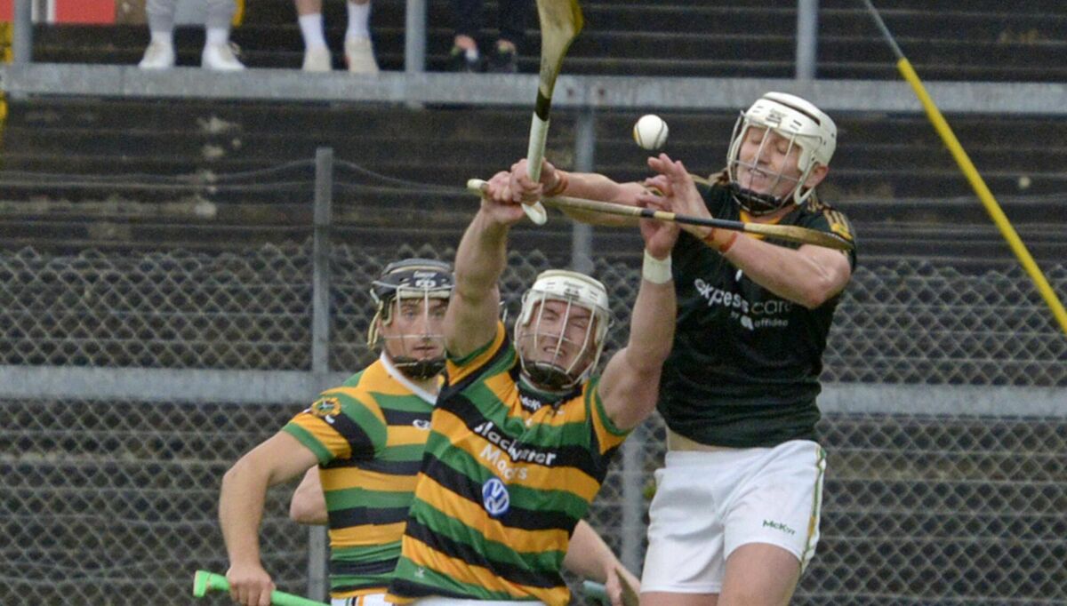 Blackrock's Niall Cashman jumping for the ball above Glen Rovers' Patrick Horgan. Picture Denis Boyle