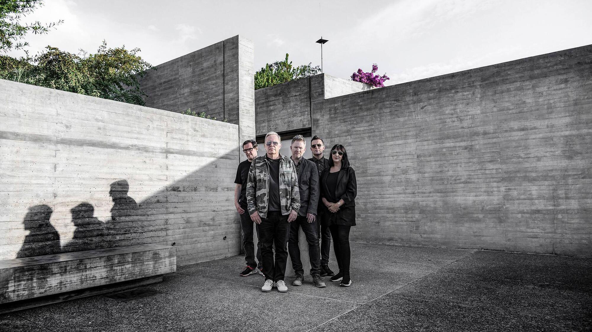 New Order's husband-wife duo on Ian Curtis, Bowie, and an era of peace in the band 