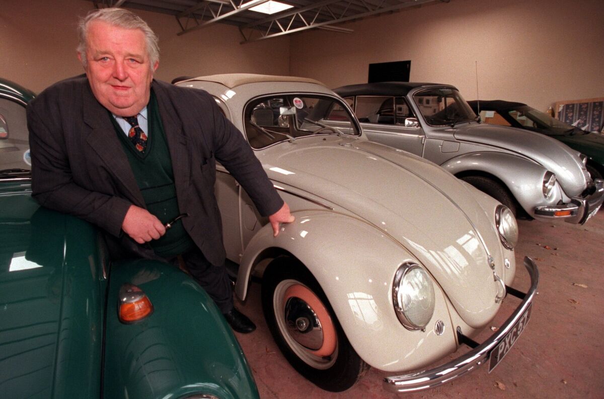 Paddy O'Callaghan, one of Ireland's main Volkswagen dealers for many years, standing next to his 1951 VW 1000 at his garage in Kanturk. Picture Dan Linehan