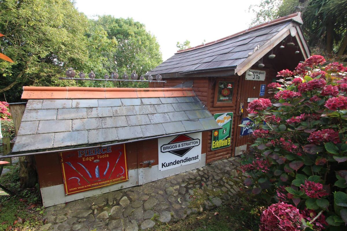 Shed your possessions? The shed is now slate roofed. The owner Hans Jurgen was a skilled plumber with high standards and a passion for all things Irish and traditional