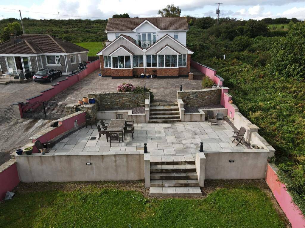 The bungalow to the left of this picture gives an idea of the size of the original Walsh home The bungalow to the left of this picture gives an idea of the size of the original Walsh home